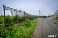 Батареи Владивостокской крепости на полуострове Назимова с видом на Русский мост закрывают забором от машин
