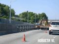В районе 14 км ремонтируют леера